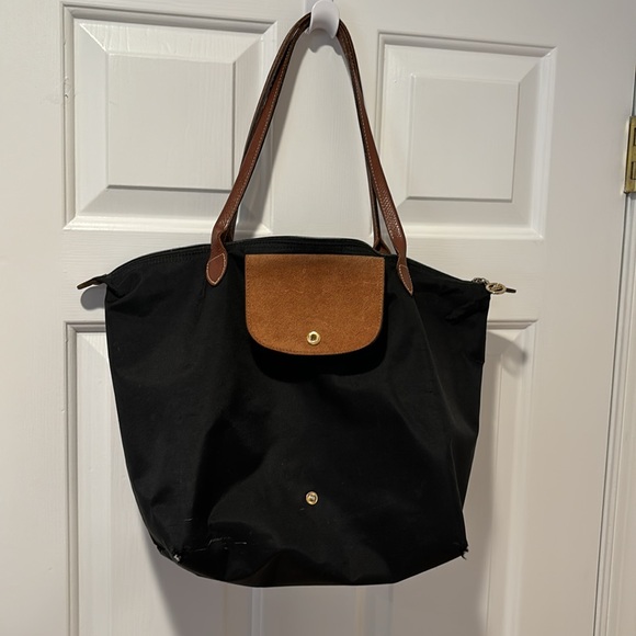 Black long champ shoulder bag. Has been worn and lots of wear and tear. - Picture 2 of 11